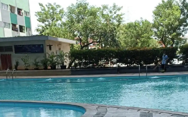 THE ROOMOS Hotel Apartemen