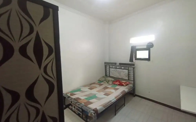 SPOT ON 93385 Penginapan Hj Lilis 2 Syariah