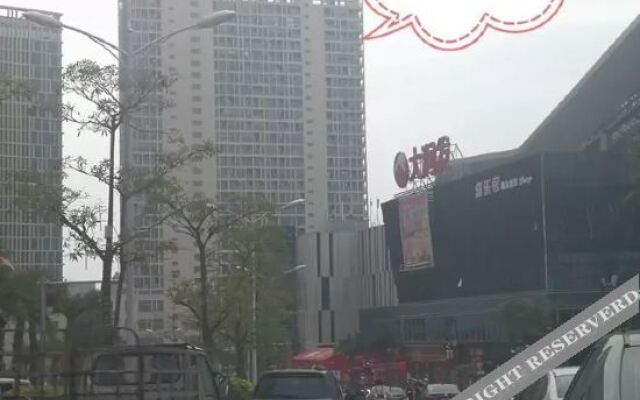 Xinyueju Boutique Apartment (Shishi Clothing City Shimao Skyscraper City Branch)