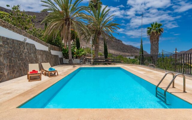 Casa de vacaciones con piscina compartida en Mogán II