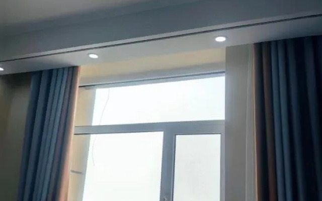 Grace Inn Qingju Hotel (Yanggu Wanhe City Branch)