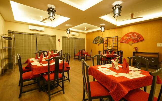 Capital O 15754 Mookkannoor Tourist Home