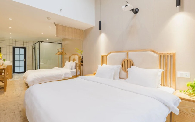 Floral Hotel Yi Shu Yu She Zhouzhuang