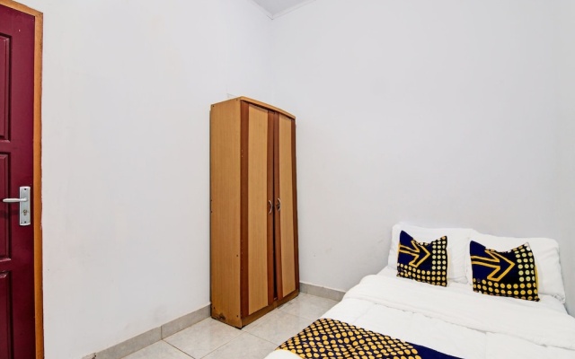 SPOT ON 91950 Guest House TekNong Syariah – Guest Rooms – Bangkinang