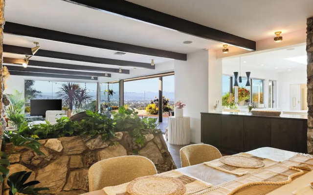 Stylish Hillside Retreat with Pool & Views