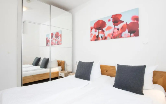 Badeweg 4 Sandkorn 1