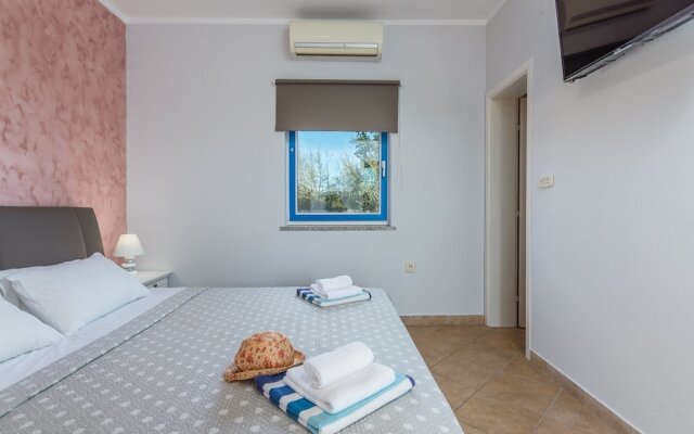 Newly built stone villa Mia with garden and pool