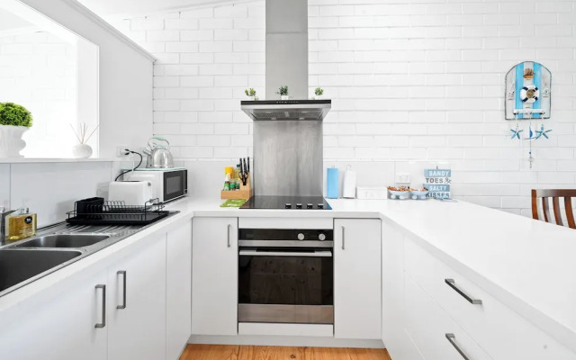 Sandy Toes and Salty Kisses