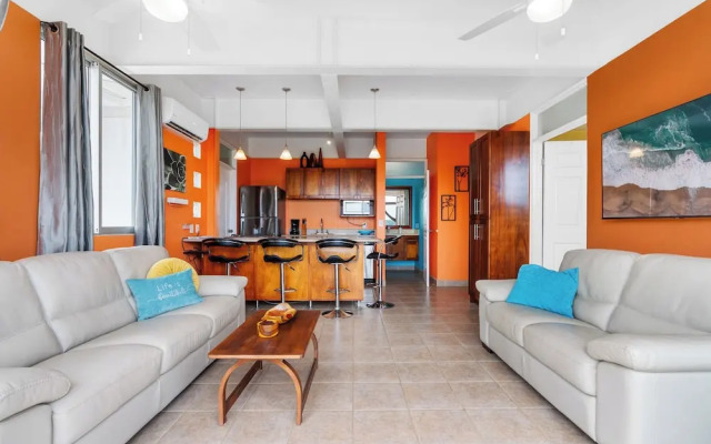 Modern Top-Floor Condo with Panoramic Views and Community Pool