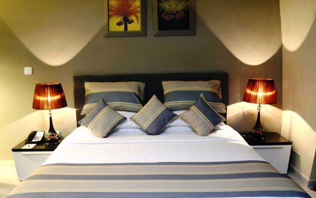 Magnum Hotel & Suites West Bay