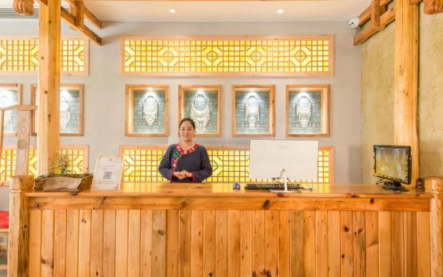 Floral Hotel Fenghuang Huercaowu