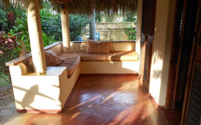 Palm-covered house in the tropical -Casa Oli
