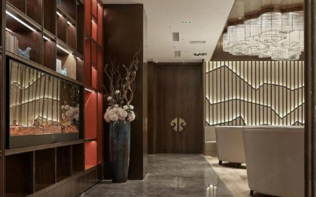 Xinzheng Xingangwanhua Hotel