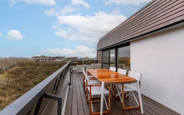 Penthouse on the Dike Bathed in Sunlight