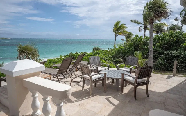 Seven Palms Serenity: Beachfront Oasis