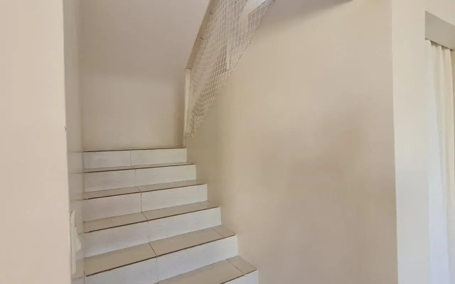 Ampla casa com 5 quartos e vista para o mar