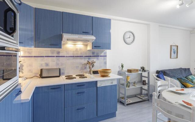 Appartement vue sur le port avec piscine commune