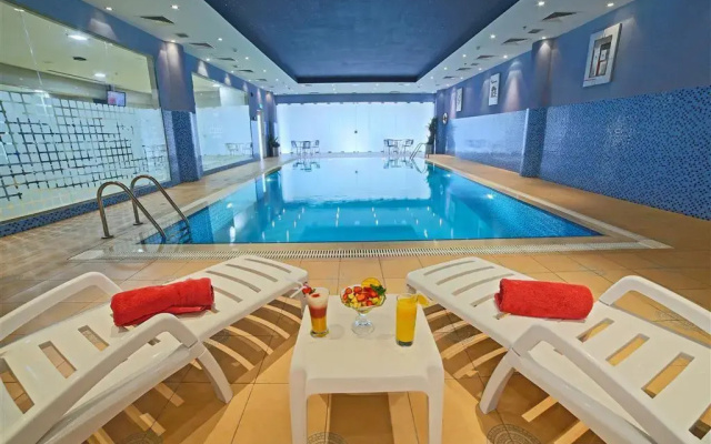 Golden Tulip Suites Breida Al Q
