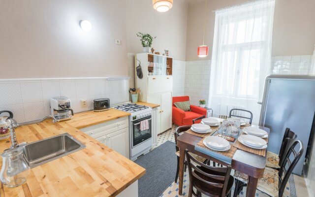 Riverside Apartment With A Balcony