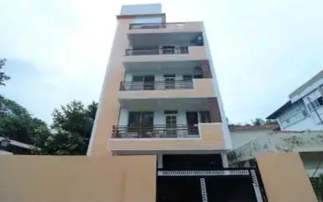 Super OYO 89879 Rawat Apartment