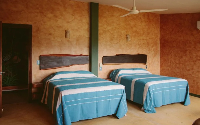 Madre Tierra Apartments
