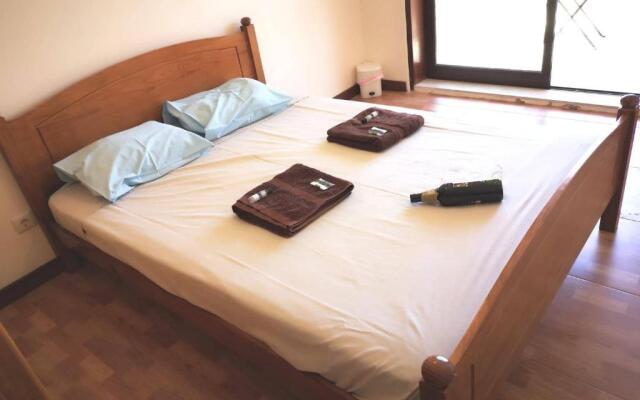Quarto com 4 camas (Beliches+ 1 Sofá-cama)