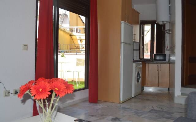 Reservaloen Puerta del Arenal / Topibe SL