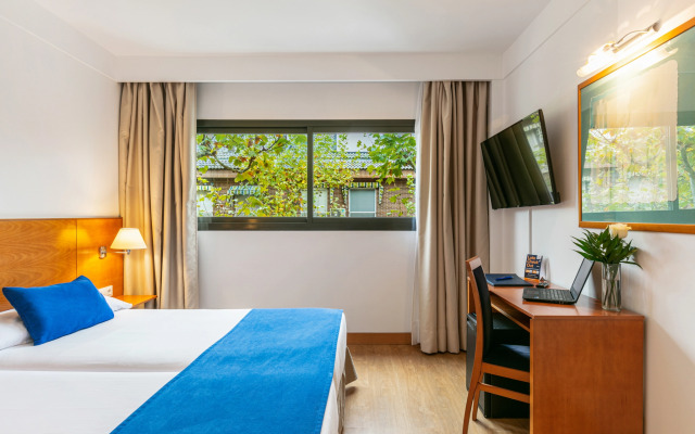 Отель Sercotel de los Reyes