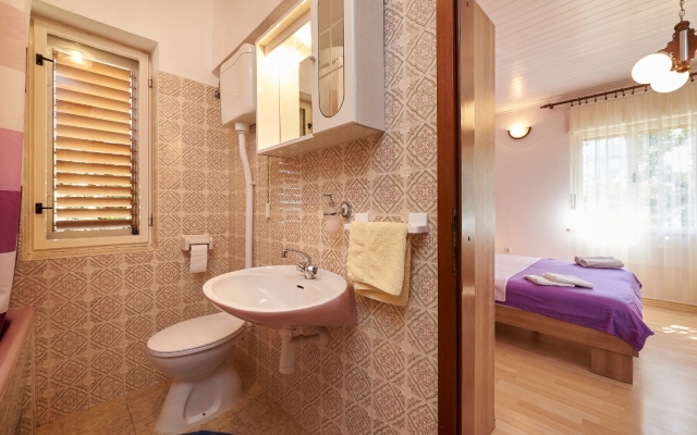 Apartment Ivo - with garden: A1 Trogir, Riviera Trogir
