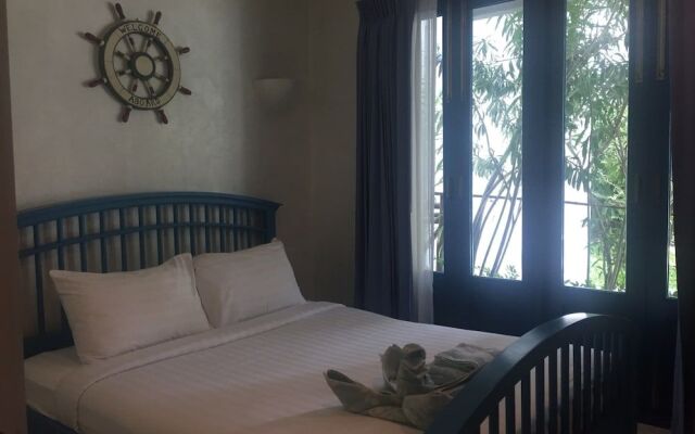 The Che Pool Access Beachfront Condo by Away