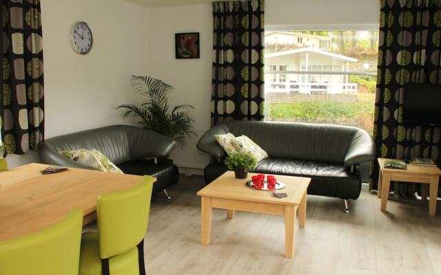 Modern chalet with two terraces and near a pond