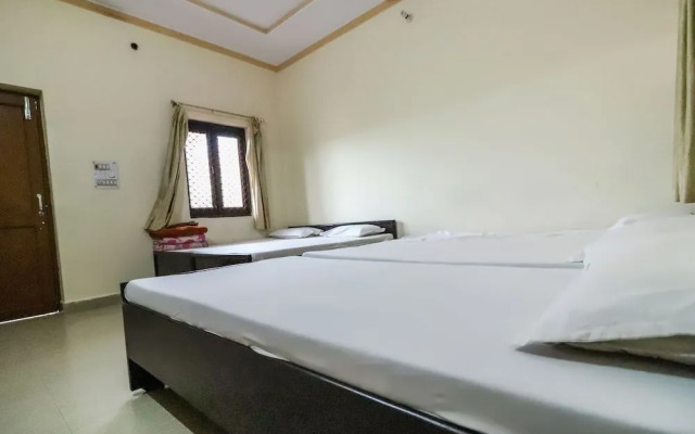 Shri Giriraj Dham by OYO Rooms