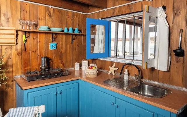 Wooden Cabin Next to the Beach