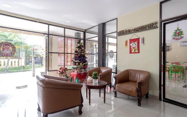 Super OYO 283 Helvetia Residence