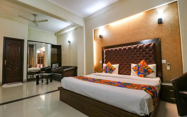FabHotel Happy Residency