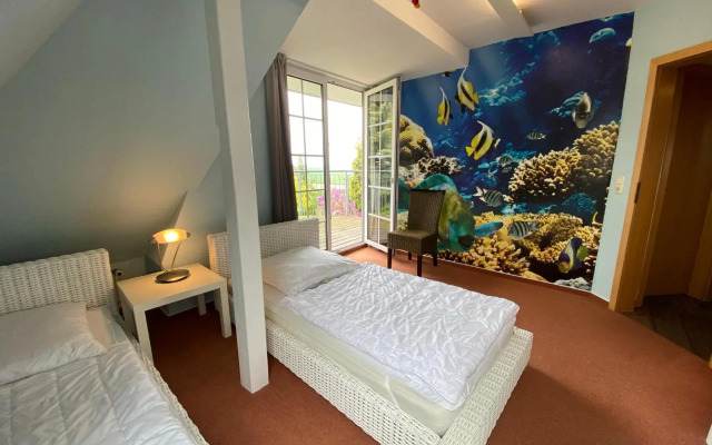 Ferienwohnung im Poolhaus mit Ostseeblick