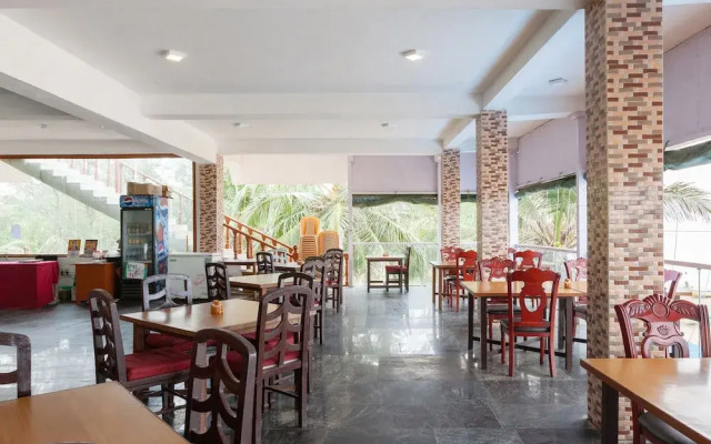 Capital O 40116 Sea Breeze Resort