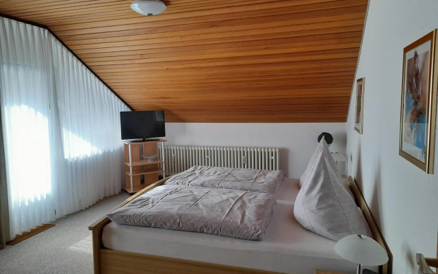 Ferienwohnung und Gästezimmer Iburgblick
