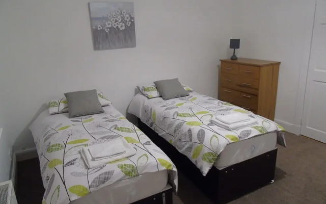 Snug - Meadhan Apartment