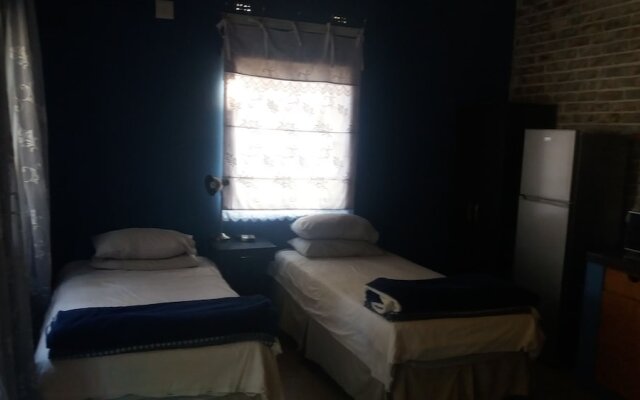 "room in Guest Room - 3 Single Bedroom in Farmhouse in Limpopo Province"