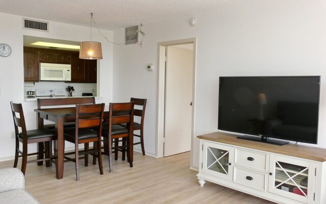 Inviting Beachfront Condo With Large Balcony and Pool