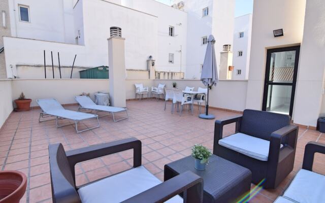 Juan de Austria - terraza y parking