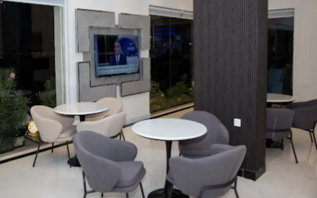 Al Mwasem Al Arbaa Furnished Apartments