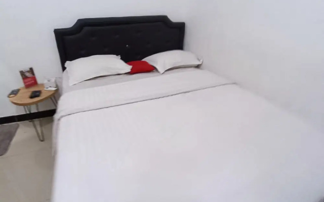 OYO 93885 D'harjo Guesthouse