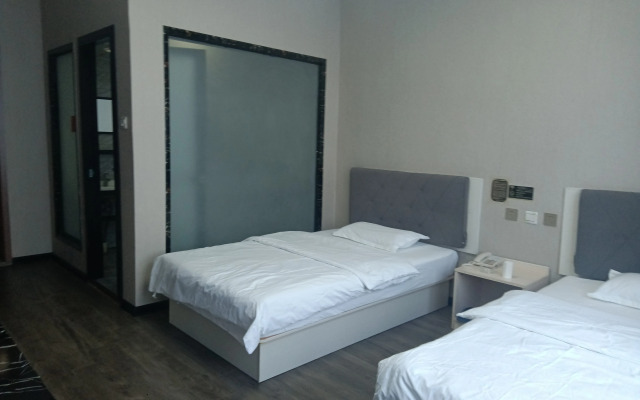 Dexin Express Hotel (Zhangqiu Harmony Plaza)