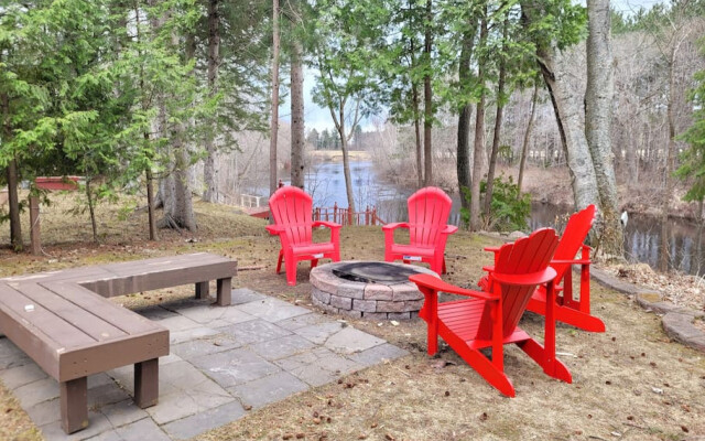 Whispering Pines Riverside Retreat