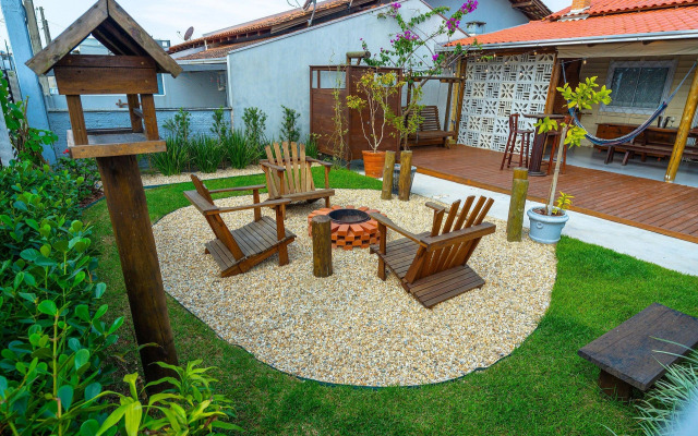 Casa com Lareira e Piscina - Varanda Incrível