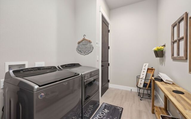 Upscale Waterfront Estate With Mountain Sunset Views