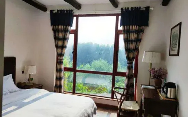 Mengzhou Hejia Courtyard Hotel