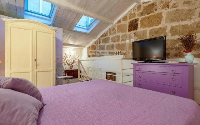 Amethyst attic in Old Town by sea